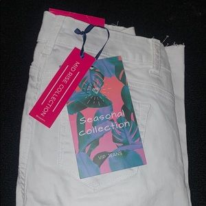 Women’s white jeans with rips